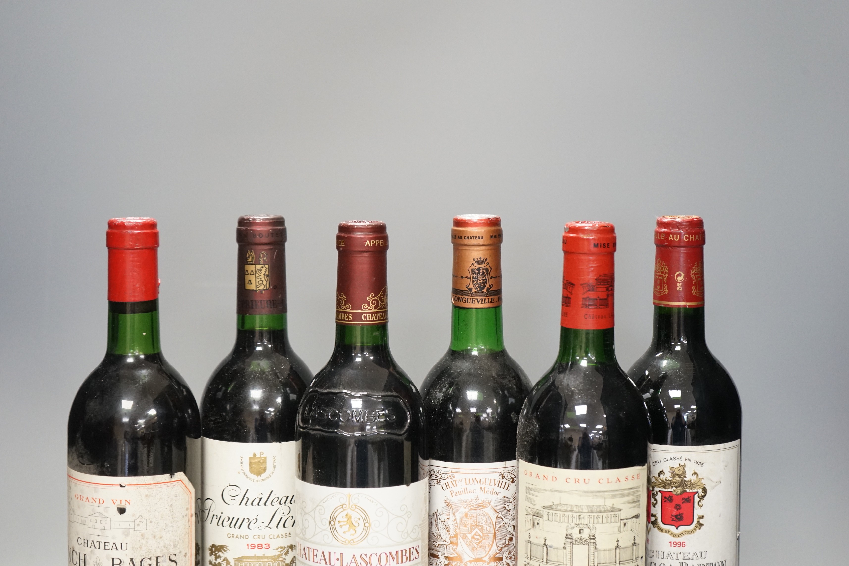 Six bottles of wine: Chateau Longville Pauillac Medoc 1979, Chateau Lascombes Margaux 1979, Chateau Lynch Bages Pauillac 1975, Chateau La Lagune Medoc 1988, Chateau Langoa Barton Saint-Julien 1996 and Chateau Prieure-Lic